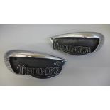 A pair of Triumph Motorcycles petrol tank badges