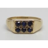 A 9ct gold and six stone sapphire ring, 3.5g, O