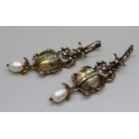 A pair of scarab drop earrings