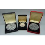Two Channel Tunnel commemorative medallions and a silver coin