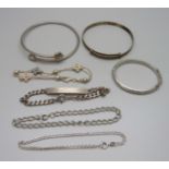 Four silver bracelets and three silver bangles including one child's, 46g