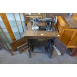 A German Pfaff oak treadle sewing machine