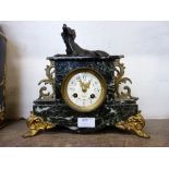 A French green marble and gilt metal figural mantel clock,