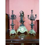 A 19th Century French onyx and gilt metal figural clock garniture