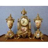 A German mid 20th Century gilt metal clock garniture