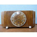 An Art Deco walnut mantel clock