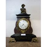 A French figural marble and ormolu mantel clock