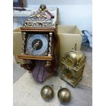 A Dutch wall clock and a brass mantel clock