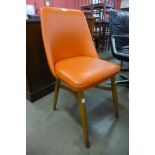 A beech and orange vinyl kitchen chair