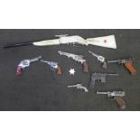 A collection of toy guns including Lone Star Luger and 73 Rifle, Cisco Kid cap gun, etc.