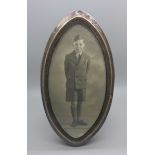 A navette shaped silver fronted photograph frame, height 20.5cm
