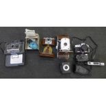 A collection of vintage cameras, including Polaroid, Minolta and Agfa