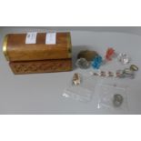 A small wooden box with miniature coach and horses, a small purse with, three silver coins, etc., (