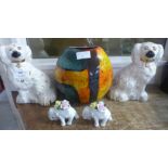 A pair of Beswick Staffordshire Spaniels, a Poole Pottery vase and a pair of Coalport Elephants, one