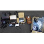 A Canon EOS 500 camera, an Agfa camera, a Vorsatz attachment, a Canon Powershot camera, a