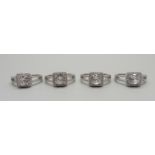 Four 925 sterling silver rings