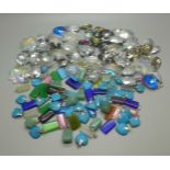 A quantity of gemstone and crystal pendants