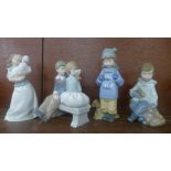 Four Nao figurines, one a/f