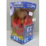 An interactive ET Extra Terrestrial toy figure, with batteries, seen working, boxed