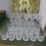 A suite of Waterford crystal; six of champagne, hock, sherry, whisky and two sets of tumblers,