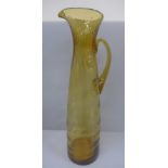 A Whitefriars glass tall golden amber jug or pitcher, 44cm