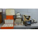 A quantity of slide projectors and slides **PLEASE NOTE THIS LOT IS NOT ELIGIBLE FOR POSTING AND