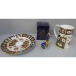 A Royal Crown Derby mug, a Fairy Wren paperweight with gold stopper, boxed and a Crown Derby plate