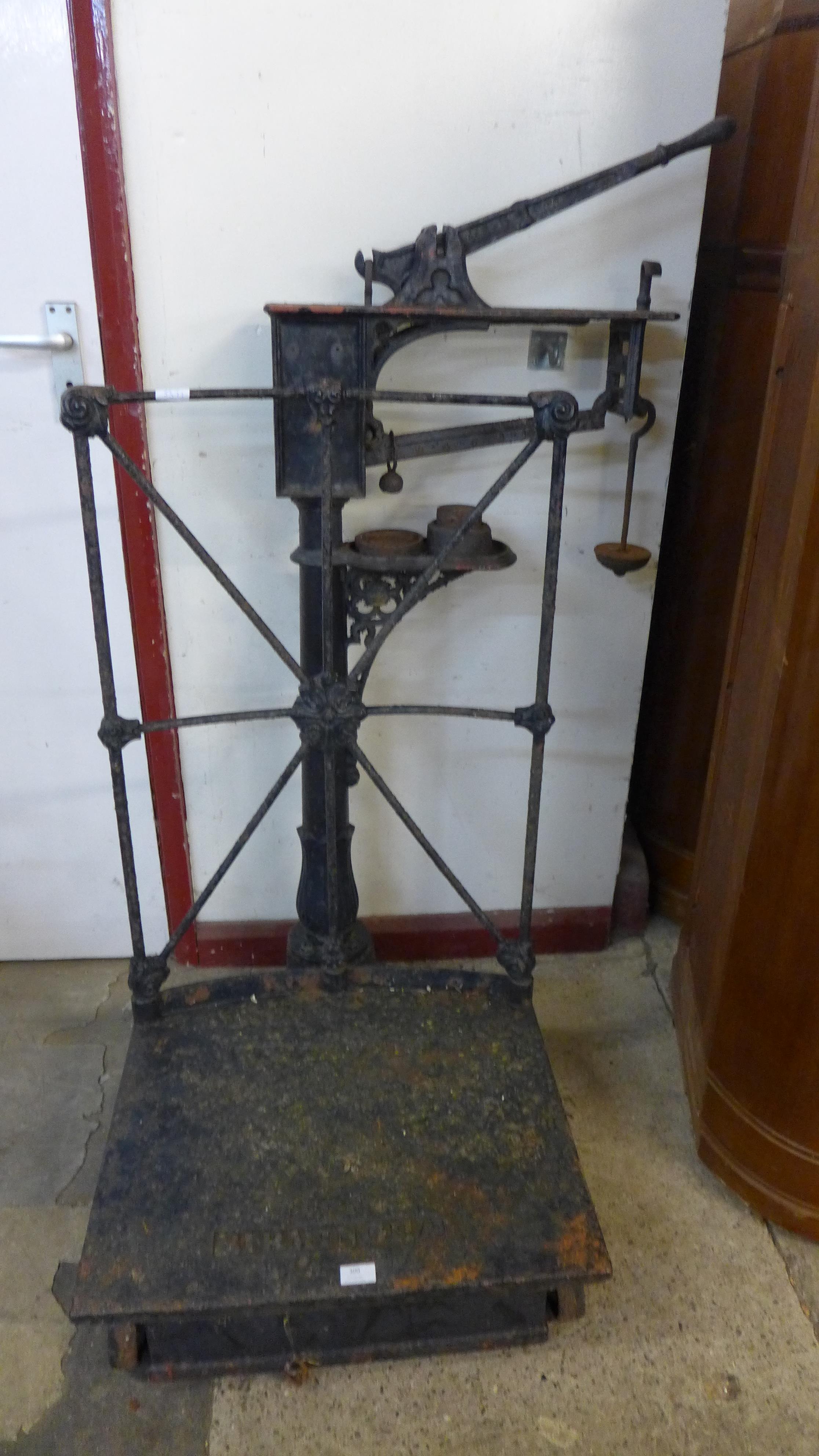 A set of Victorian cast iron weighing scales