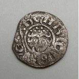 A hammered silver short cross coin