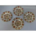 Four Royal Crown Derby 1128 pattern tea plates