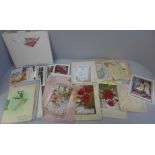 A collection of early 20th Century cards and postcards