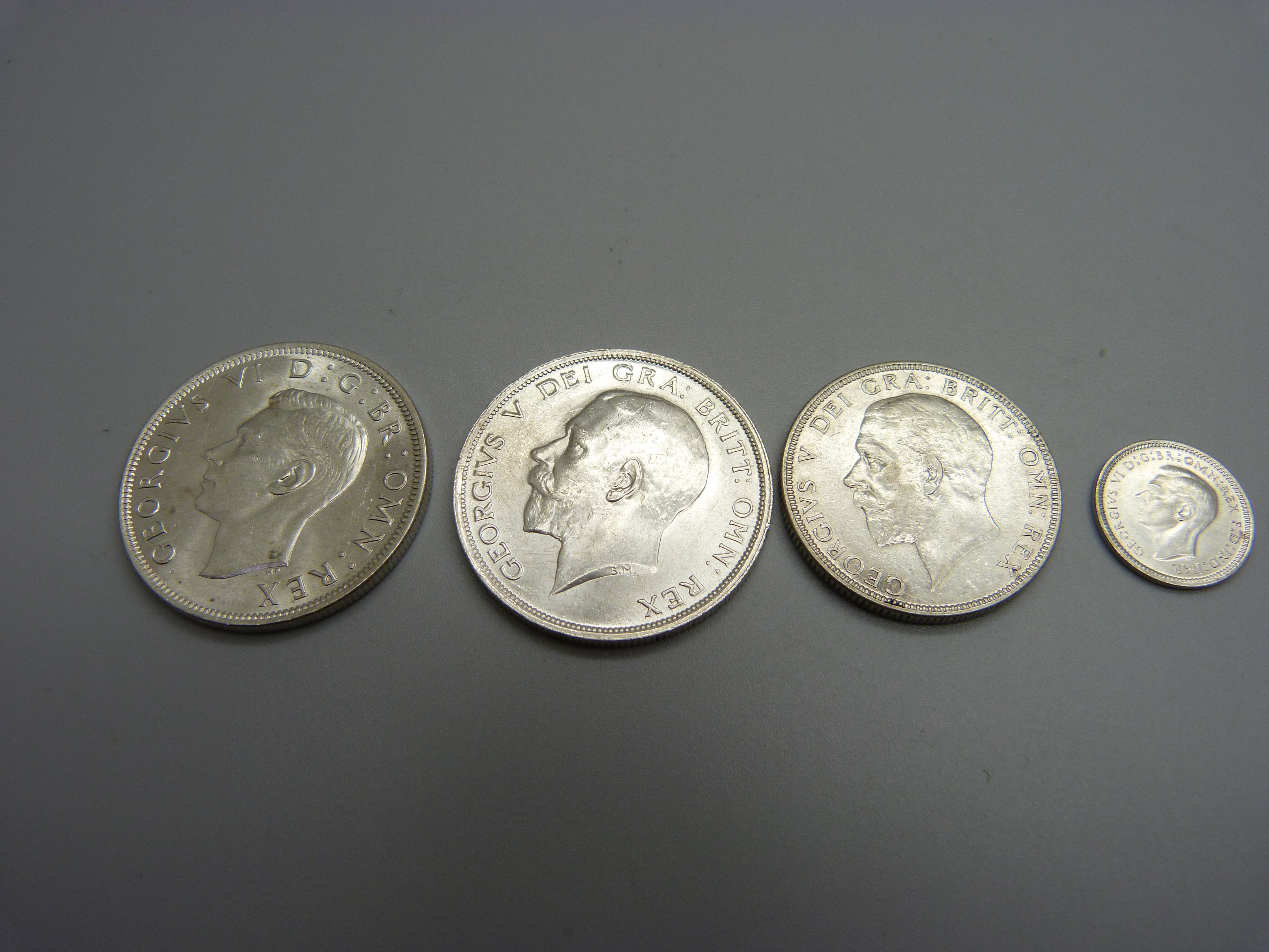 Two half-crowns 1915 and 1945, a 1936 florin, a 1937 sixpence and a 1948 Australian 3d coin - Image 2 of 4