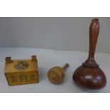 Two wooden mallets and a treen money bank