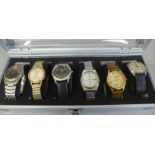 An aluminium watch storage box with six wristwatches including Citizen automatic and Oris Super