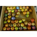 A collection of brightly coloured marbles