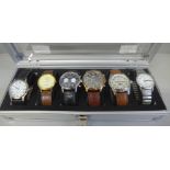 An aluminium watch storage box with six wristwatches including Rotary Avenger chronograph