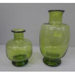 A set of two 1950's green signed Holmegaard art glass vases designed by Per Lutken, 21cm and 14cm