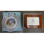 An Orient Express picture frame and a Royal Doulton Winnie the Pooh plate