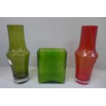 A pair of vintage Finnish 1970s Riihimaki vases designed by Tamara Aladdin in green and red, 25cm