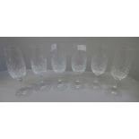 Six cut glass champagne flutes