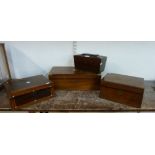 A George IV rosewood sarcophagus shaped tea caddy, two Victorian walnut writing slopes and a