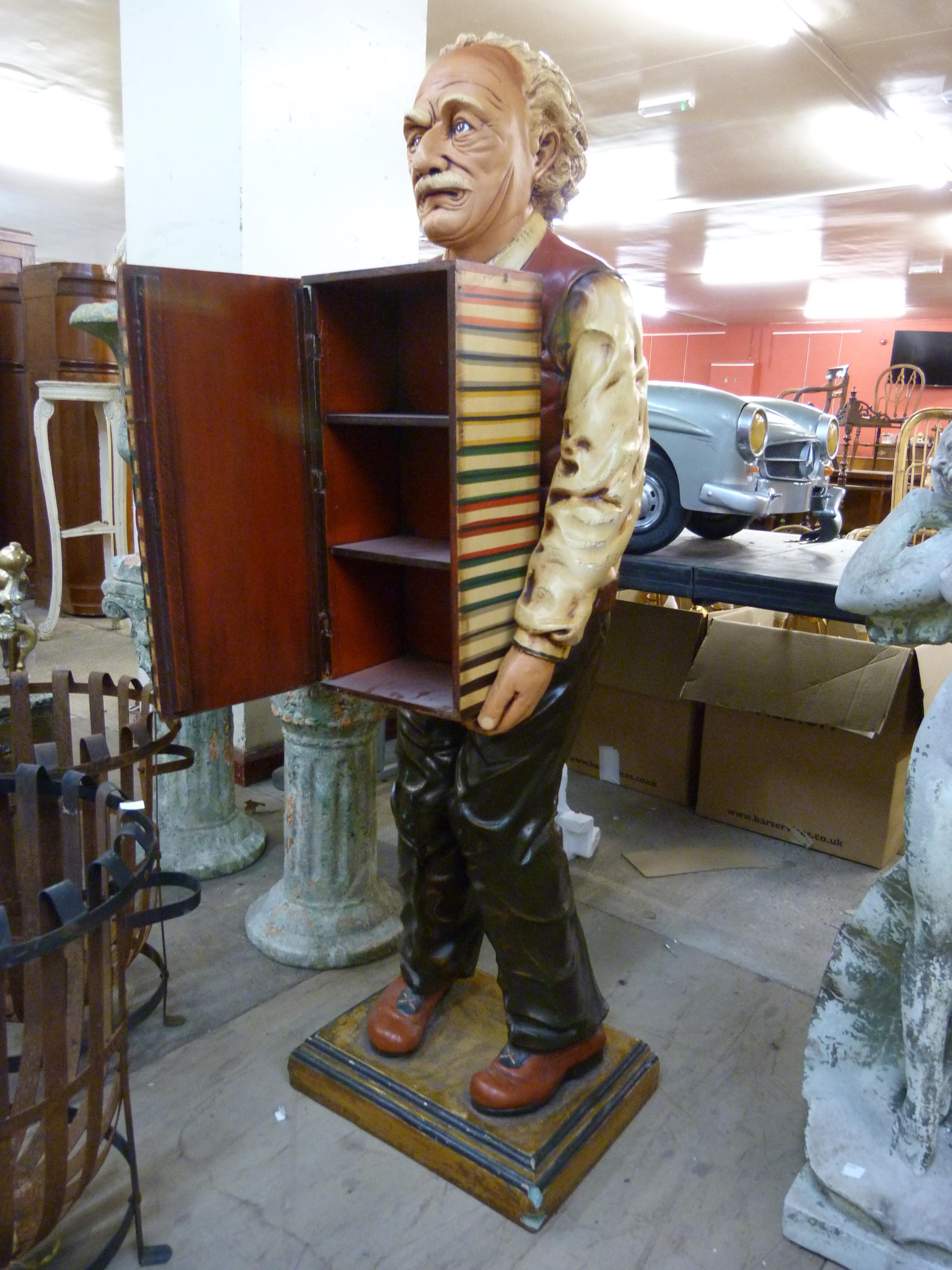 A painted figural fibreglass cabinet, in the form of Albert Einstein holding books - Image 2 of 2