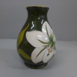 A Moorcroft Bermuda Lily vase, 13.5cm