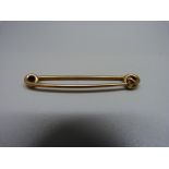 A 9ct gold pin, 5.4g