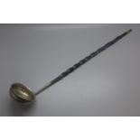 A 19th Century ladle with baleen handle