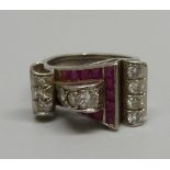 A white metal, ruby and diamond ring, 10.4g, L