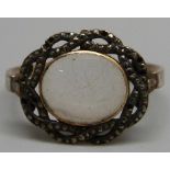 A George III mourning ring, the enamelled shank with dedication to William Stanley dated 1768, N