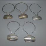 A set of five George III silver decanter labels, London 1793, Robert Barker