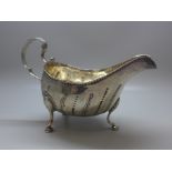 An Irish silver sauce boat, repaired at the handle, 143g