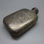 A hammered silver hip flask, London 1899, 112g